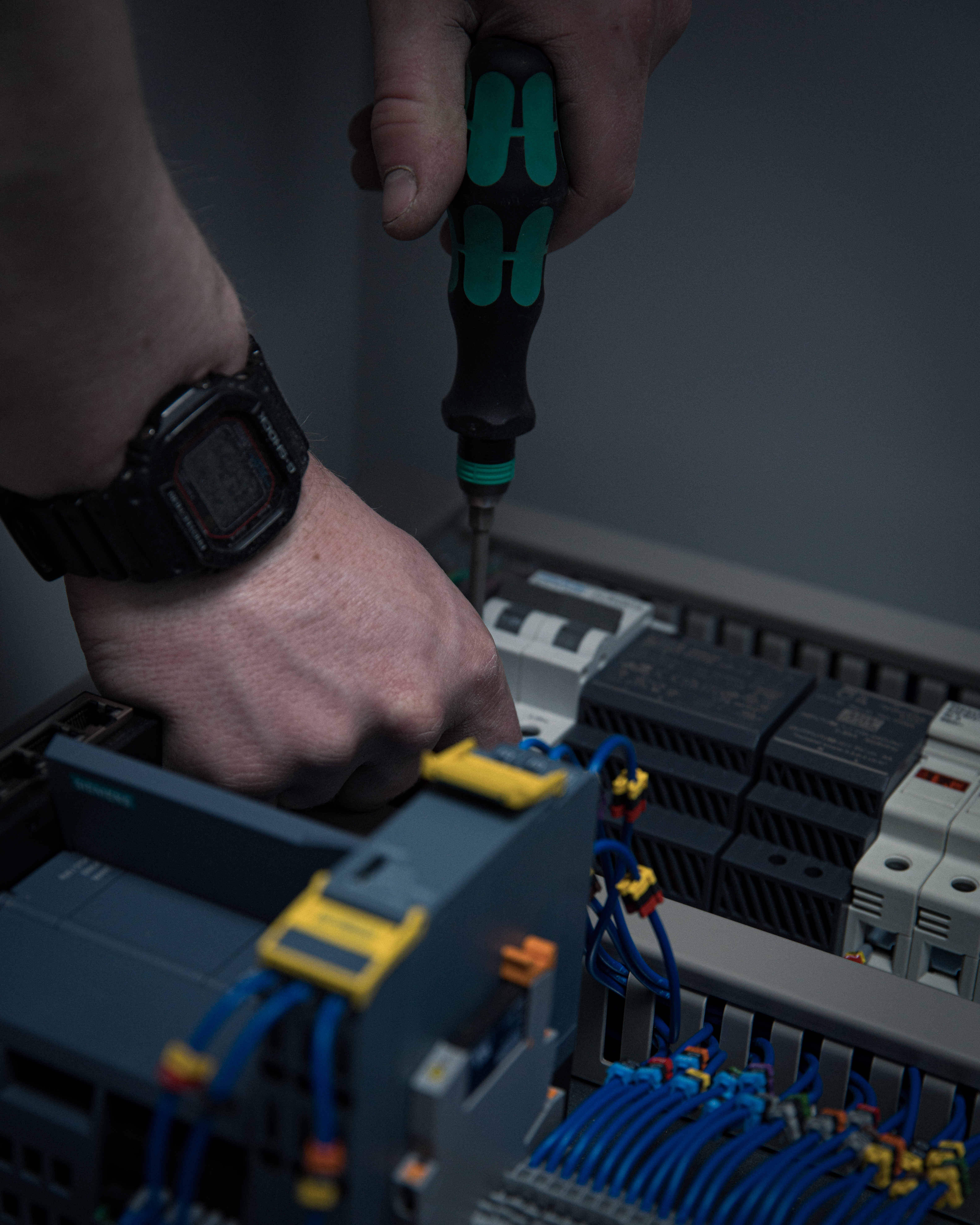 ProtoGT engineers working on an industrial control system.
