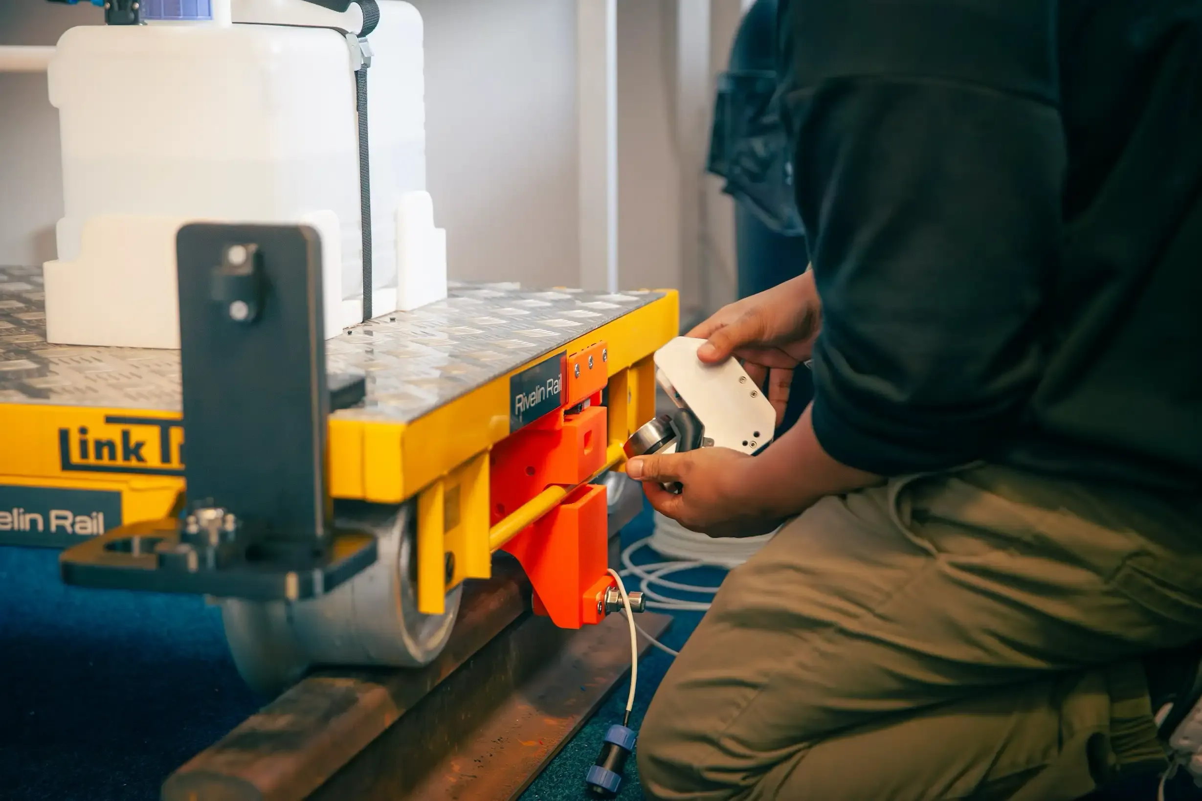 ProtoGT installing the friction measurement sensor on the trolley assembly
