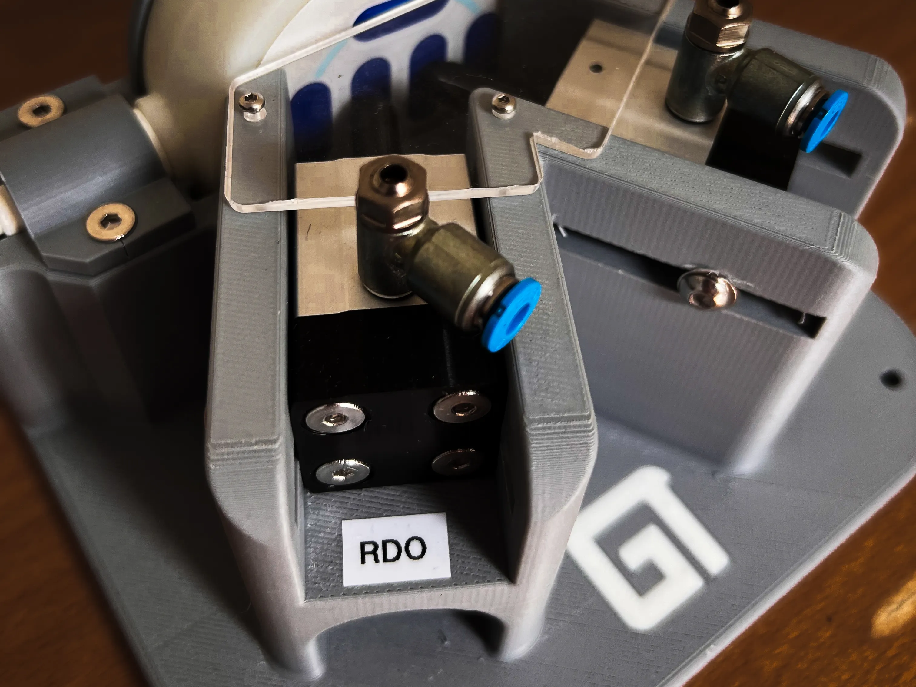 Fully assembled Quadsense puck actuator mount system