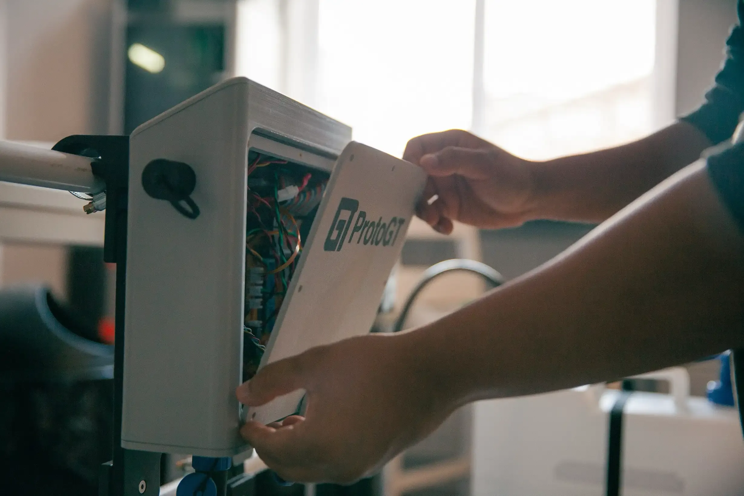 ProtoGT accessing the trolley electronics enclosure during build and test
